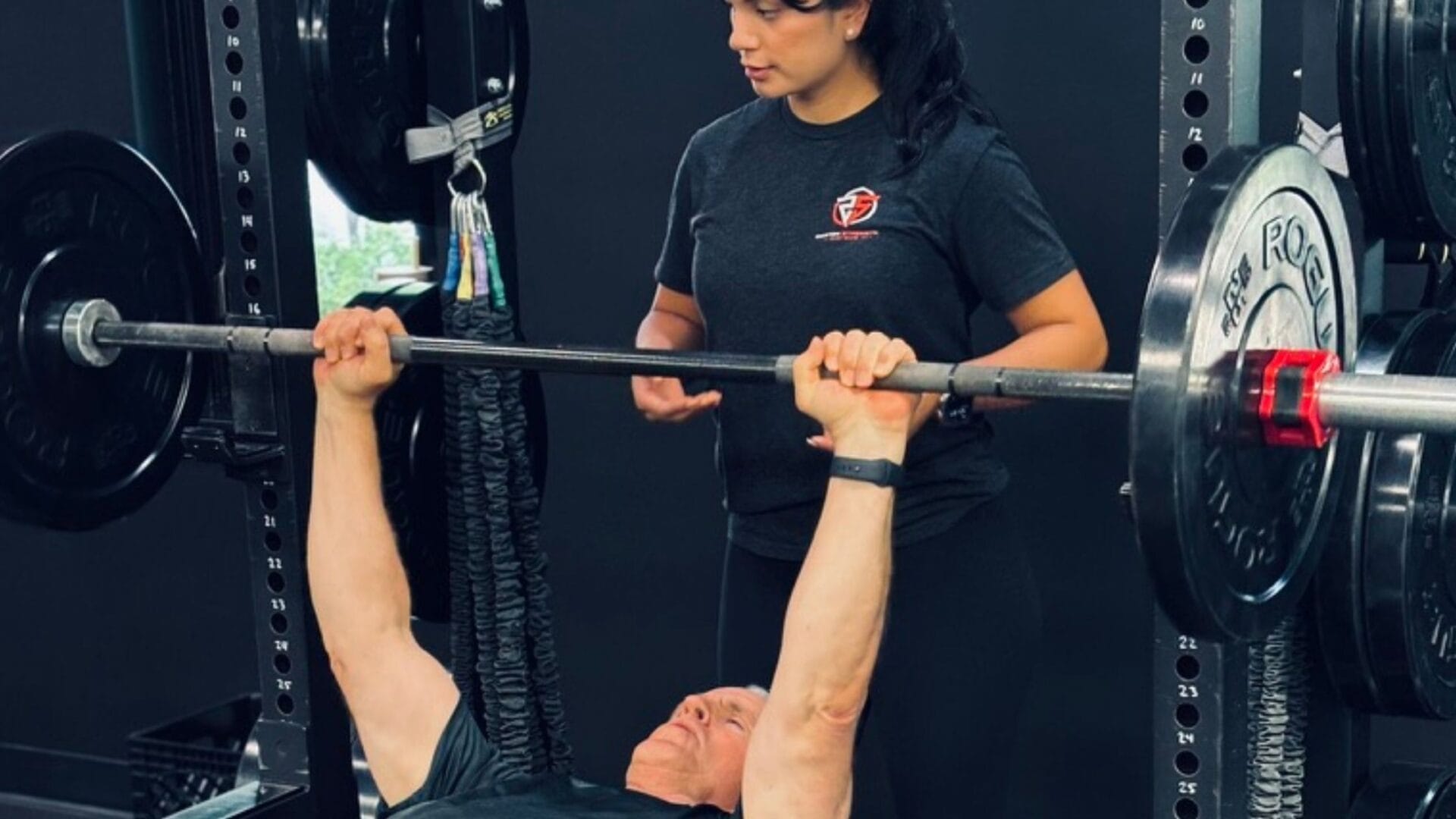 man training with his personal trainer at Oakton Strength Systems